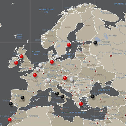 Closeup of Europe on Earth Toned World Map with Pins